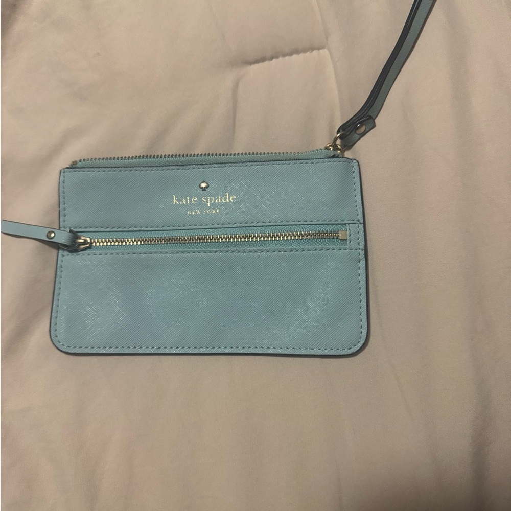 kate spade baby blue wristlet with front zip pocket